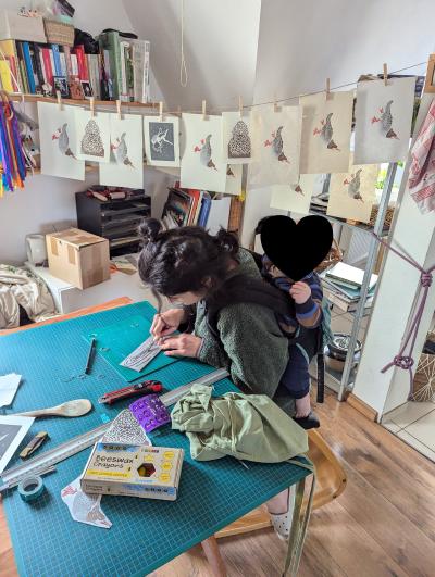 carving_with_baby.jpg
